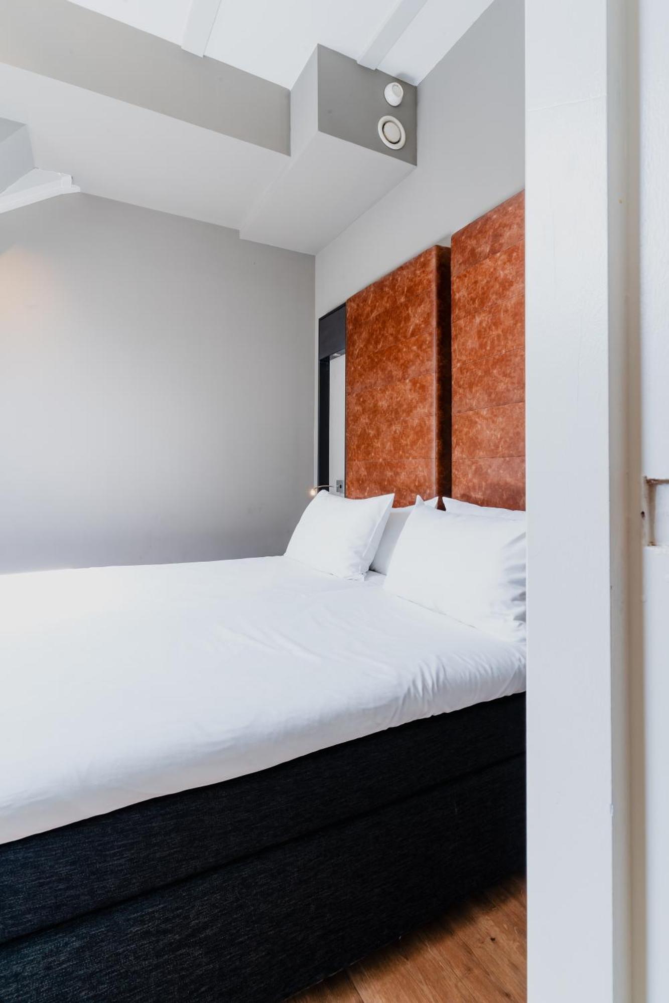 Apartments De Hallen Амстердам Номер фото